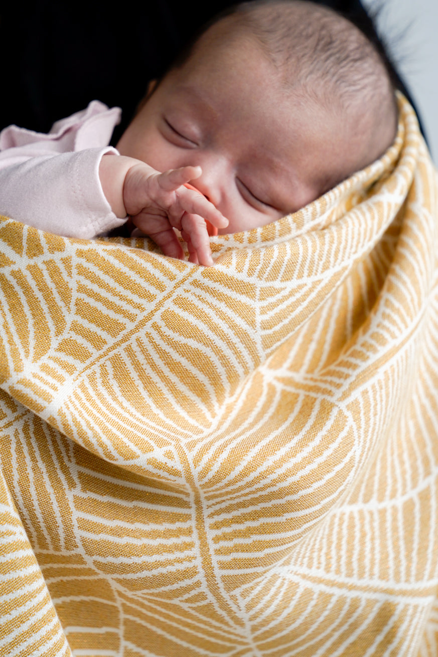 Folhas douradas de cobertor de bebê